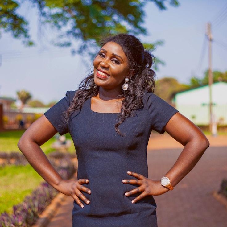 Amina Rao, Lead Design Curator at Adaptive Growth Solutions, reviewing corporate floral arrangements